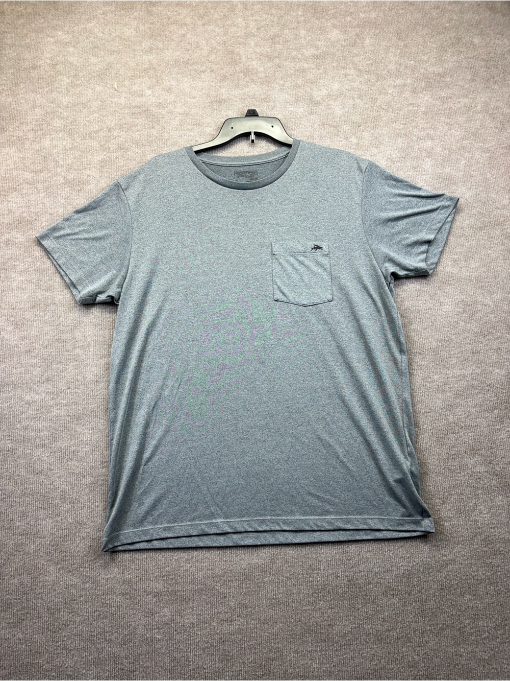 Patagonia Flying Fish pocket t-shirt featuring their iconic black flying fish an
